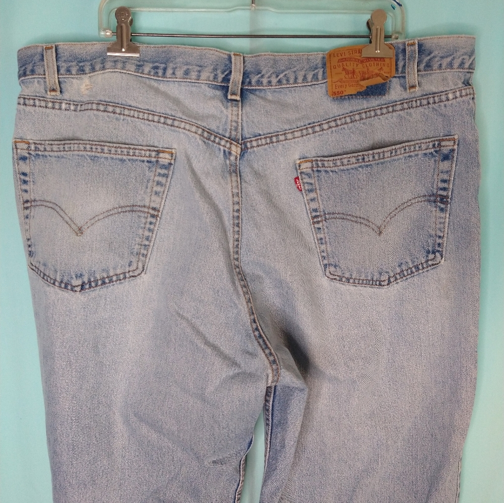 Mens Levi’s 550 light washed jeans red tab